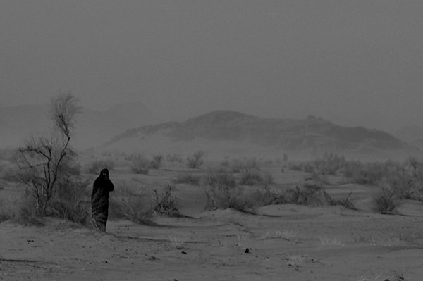 Genius Loci #9 by Jeremy Chin - Woman in Burkah Standing in Jordan Desert