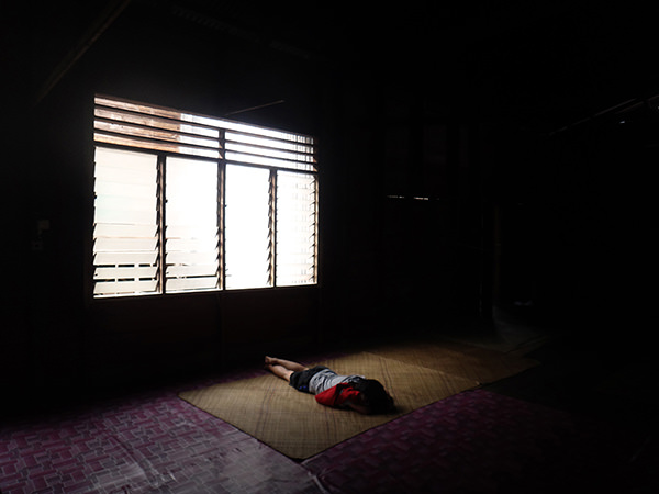 Quiet Times #6 by Jeremy Chin - Sleeping in Long House, Bario, Sarawak